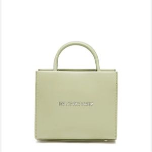 Brandon blackwood end systemic racism leather bag